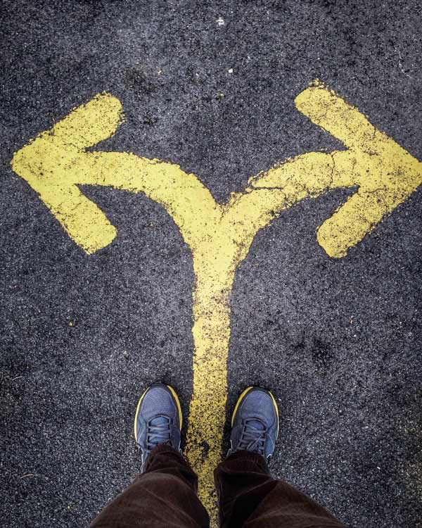 person at a crossroads making a decision