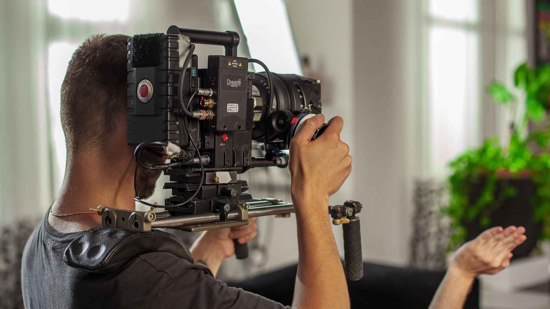 videographer filming for client video marketing